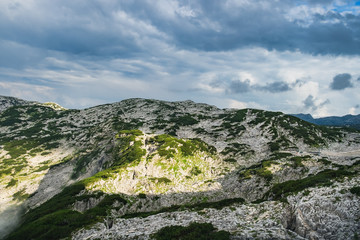 Alpine summer landscape with picturesque green mountain slopes, beautiful nature of Dachstein Mountains, Salzkammergut region, Upper Austria