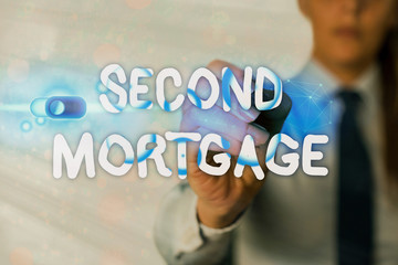 Writing note showing Second Mortgage. Business concept for lien on property which is subordinate to...