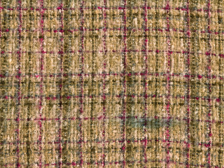 Texture of colored woolen fabric. Fabric with straight and intersecting lines