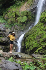 Women enjoying nature at Klong Lan waterfall in Klong Lan national park at Kamphaeng Phet, Thailand	