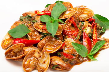 Stir Fried Clams with Roasted Chili Paste on white plate.