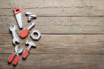 Happy father's day concept. Cookies on a wooden background. Place for text