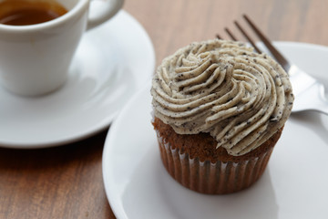chocolate cupcake with coffee cup
