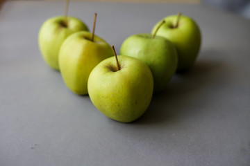 Apples on gray background