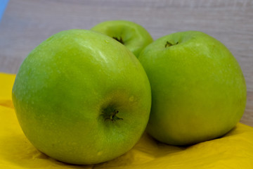 green apples on the table