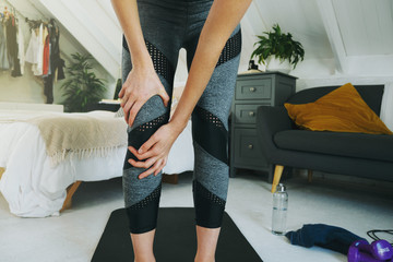 Female injured her knee during home workout in her room