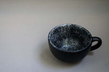 Black cup, space inside