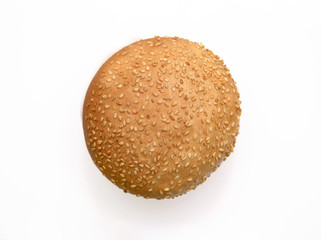 Fresh fragrant bun for burgers with sesame seeds on a white background. Can be used for advertising