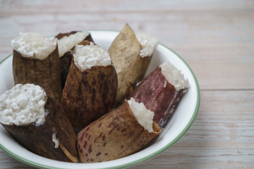 Glutinous rice steamed cooked with coconut milk in pitcher plants known as lemang periuk kera is a traditional malay  food famous during Eidul Fitri festive and rarely to find. Selective focus.