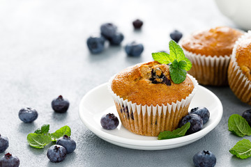 Blueberry banana muffins with fresh berries