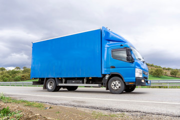 Fototapeta premium Delivery Truck Motion Blur