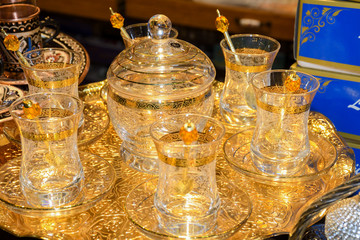 Fototapeta na wymiar Local traditional handicraft tea and coffee pots and cups (Turkish style).