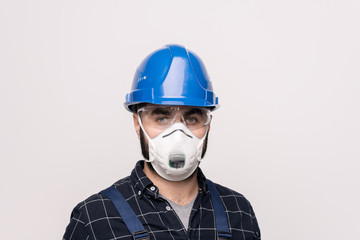 Head and shoulders portrait of young contemporary engineer or builder