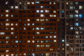 Butovo Park, Leninsky district of Moscow region, Russia-2020 . An area with numerous residential buildings. Suburbs. Suburban town in lights. Multicolored light in the Windows. Evening in the city.