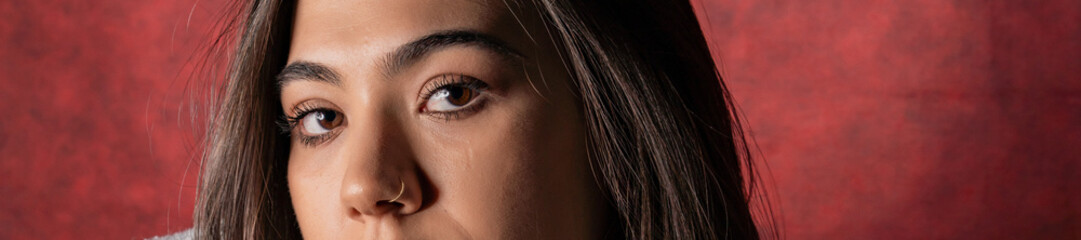 Fototapeta premium close up of young woman with brown eyes.