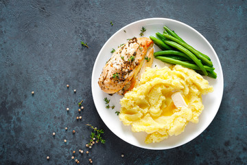 Grilled chicken breast with mashed potatoes and green beans