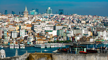 Naklejka premium Bosphorus of Istanbul, Halic, Buildings, Mosque Minarets, Blue Sky, Daylight, European side, Asian side, Harsh Light