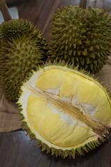 Delicious fresh sweet taste of durian on the wooden table, king of fruits in Thailand