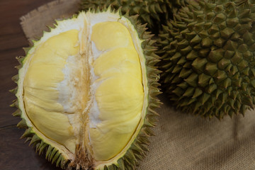 Delicious fresh sweet taste of durian on the wooden table, king of fruits in Thailand