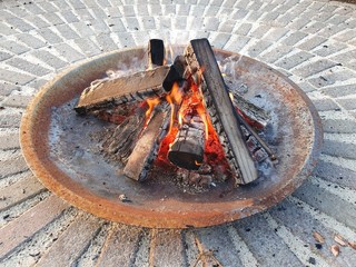 Fire pit in garden with rust iron brazier - 347246483
