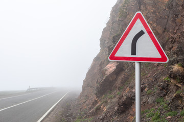Sharp turn warning road sign