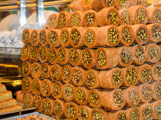 Various types or many colorful assortment of Turkish delights rolls for sale in a shop in Istanbul