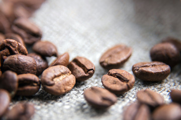 Coffee beans close-up. Beautiful coffee background. Artistic blur.