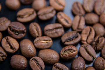 Coffee beans close-up. Beautiful coffee background. Artistic blur.