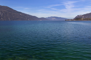 panoramic view of the water surface lake and mountains landscape summer sports hiking camping travel concept 