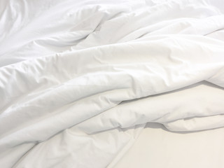 Fototapeta na wymiar Soft smooth white silk fabric background. Fabric texture