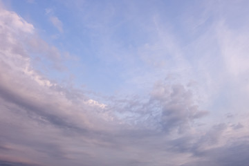Naklejka na ściany i meble abstract background of cloudy sunset sky, blue hour