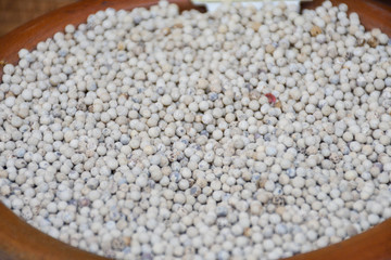 Mixed peppercorns background. Different colored peppercorns, close up.