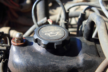 Dirty car engine. Motor oil. Close-up. Background. Texture.