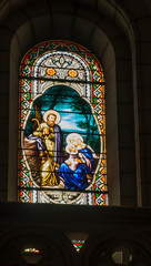 Obraz premium BETHLEHEM, Palestinian Authority, January 28, 2020: Colorful stained glass window in Carmelite convent on the Hill of David in Bethlehem.