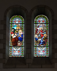BETHLEHEM, Palestinian Authority, January 28, 2020: Colorful stained glass window in Carmelite convent on the Hill of David in Bethlehem. - obrazy, fototapety, plakaty