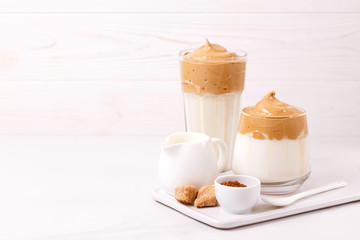 whipped dalgona coffee with milk and cane sugar. South Korean summer drink