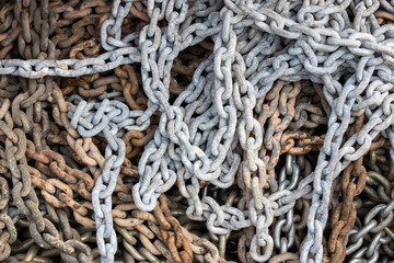 Stack of rusty chains close-up. They use industry and maritime. Close up.