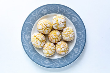 Crinkle orange cookies with sugar icing