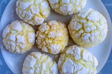 Crinkle orange cookies with sugar icing