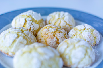 Crinkle orange cookies with sugar icing