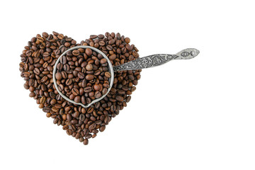 coffee pot with coffee beans in the form of a heart symbol