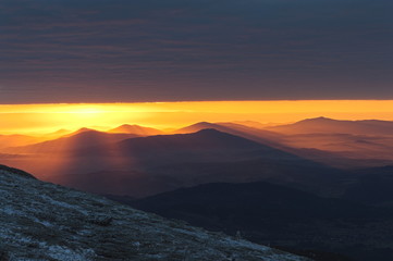 Red sunrise in the mountains. 