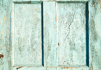 Blue cracked and swollen paint with rust texture. Grunge rusty metal background. Stains of rust.