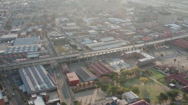 Late afternoon aerial shot of the M1 double decker highway bridges in Johannesburg, South Africa.