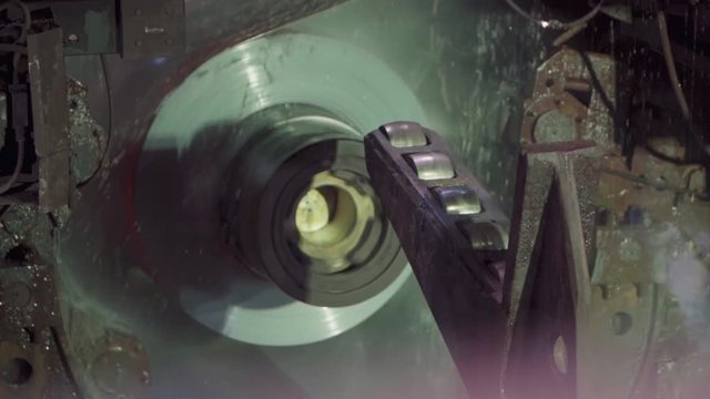 Roll of metal sheets on industrial machine. Automation of work.