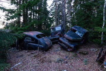 Three old black car wreck