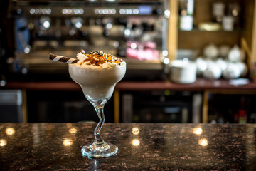 Hot chocolate drink with sweet cream and ice cream