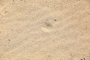 sand with traces of rain. raindrops on dry sand