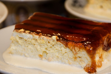 Turkish Traditional Ramadan Dessert Gullac with grated pistachio on top which made with milk