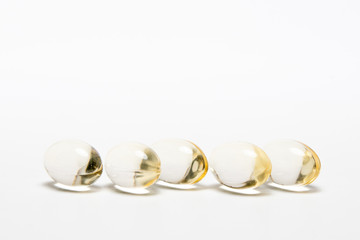 Pills over white background.
